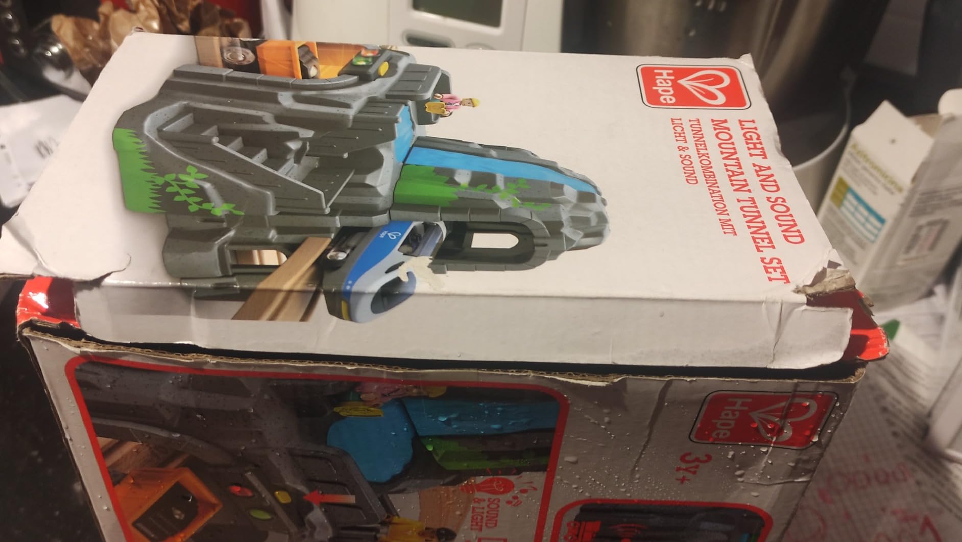 Hape Set Montagna galleria treno legno luci e suoni