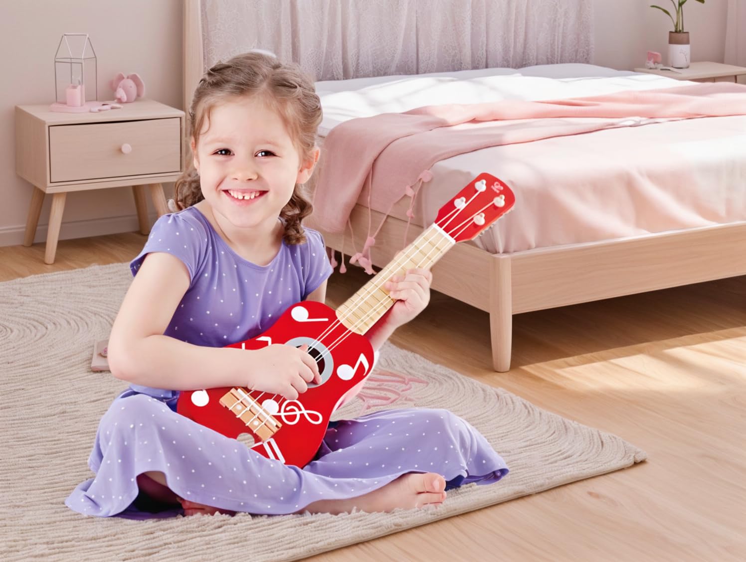 Hape E0603 ukulele in legno rosso accordabile dai 3 anni
