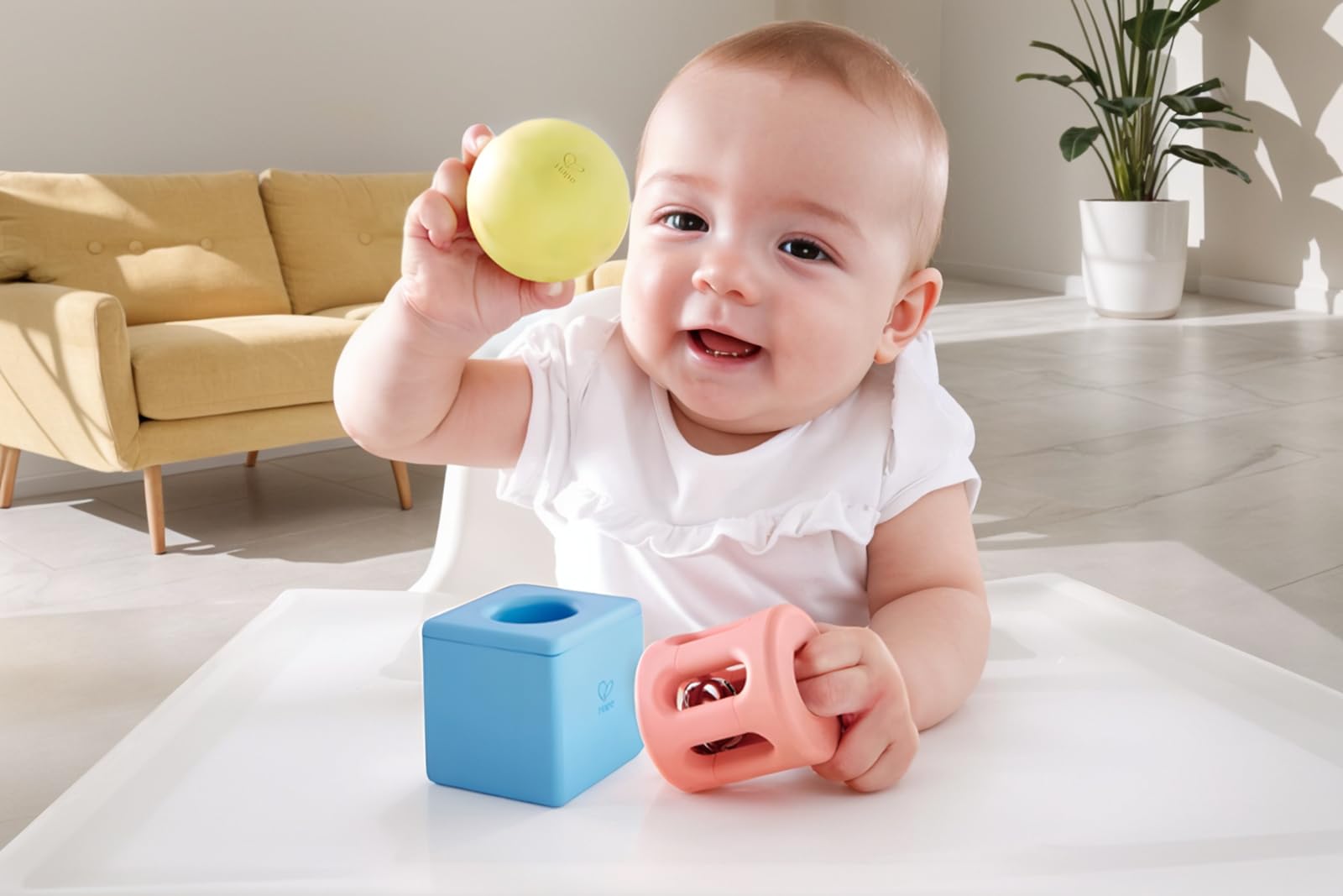 Hape Baby set sonagli geometrici neonato 3 pezzi pastello