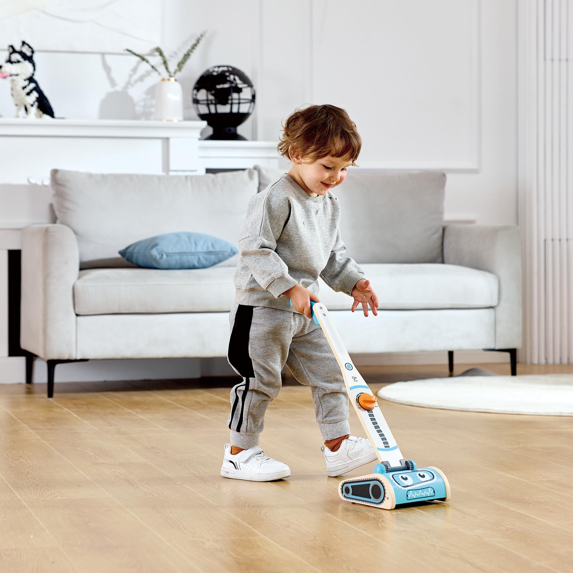 Hape aspirapolvere giocattolo bambini robot con rifiuti