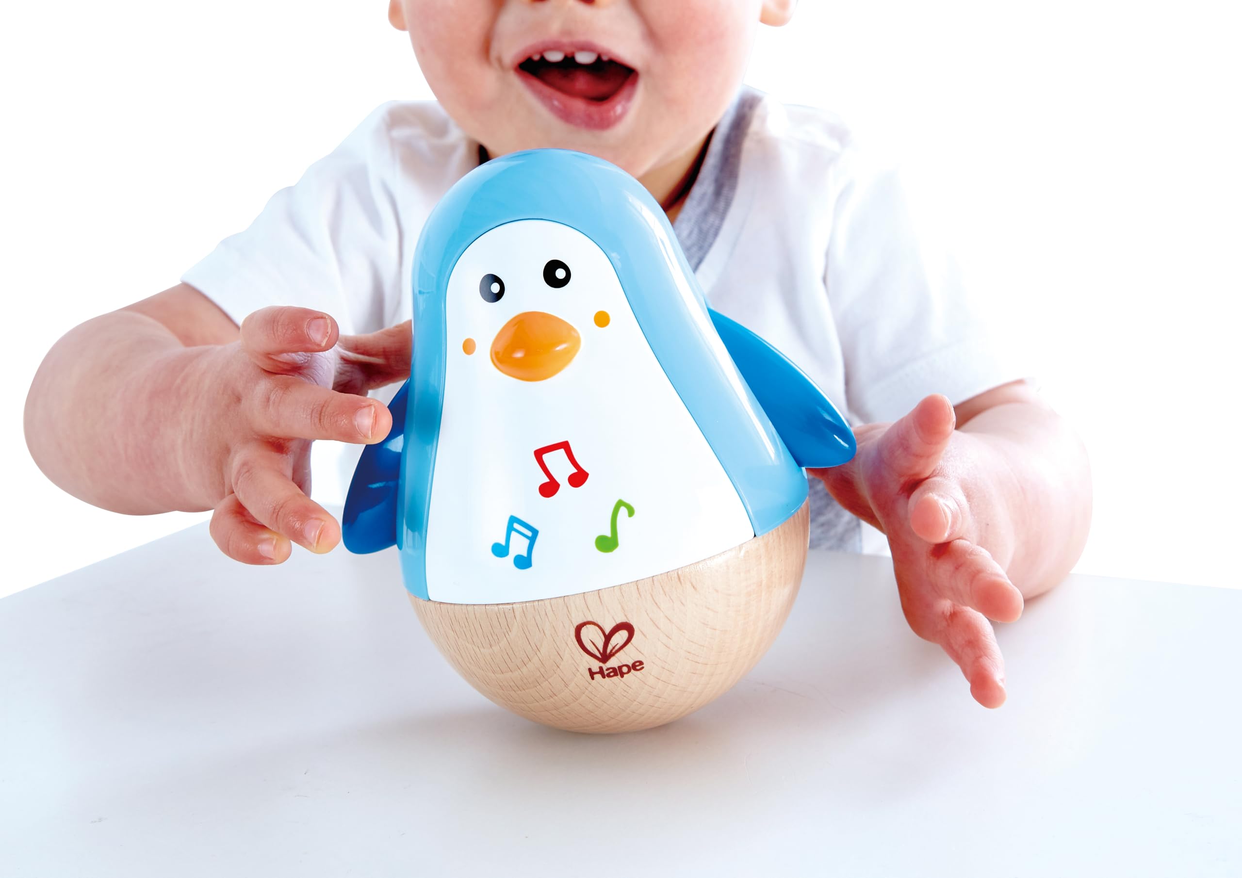 Hape Pinguino Musicale Oscillante Gioco in Legno 6 Mesi