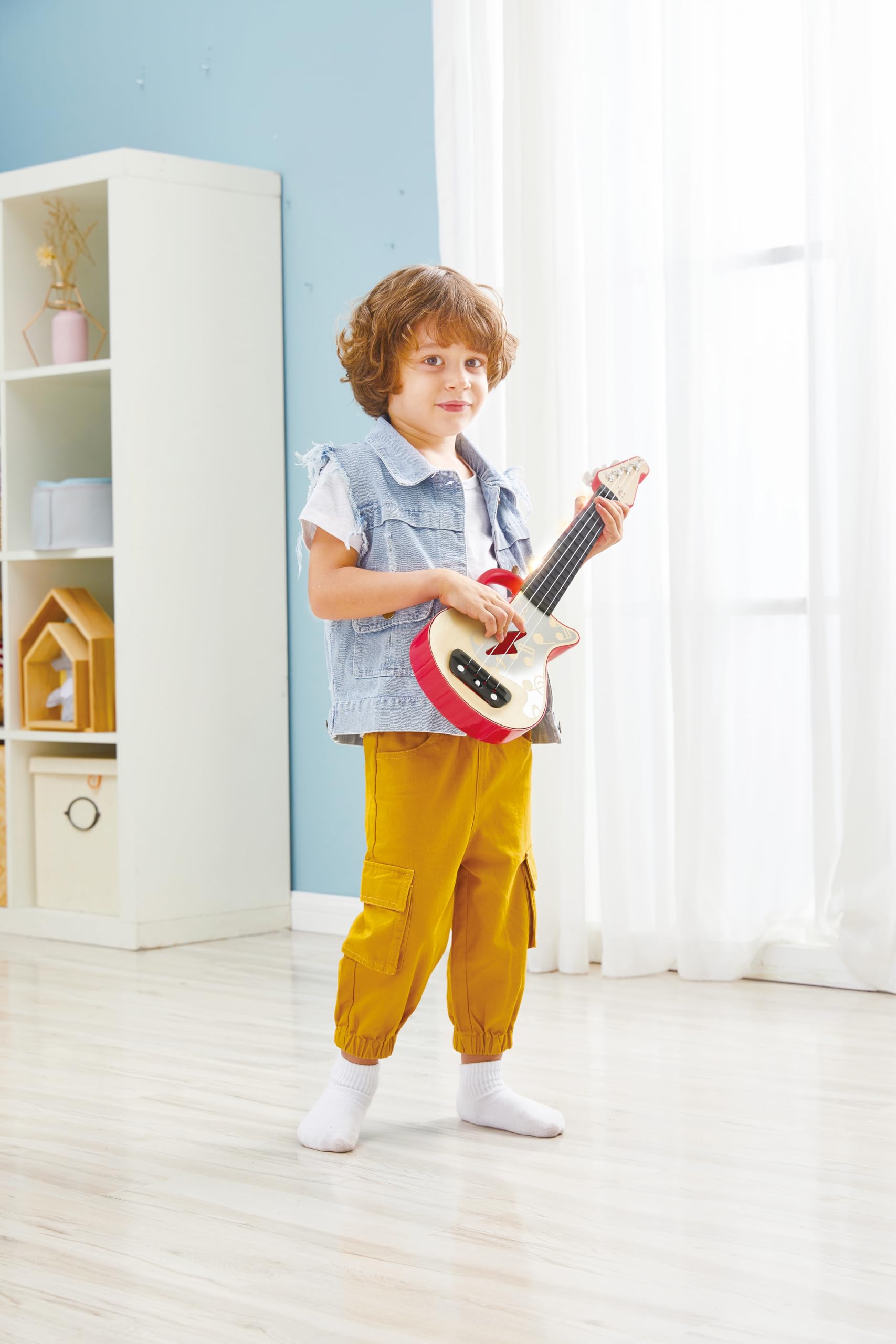 Hape Impara con le Luci ukulele giocattolo rosso 3 anni