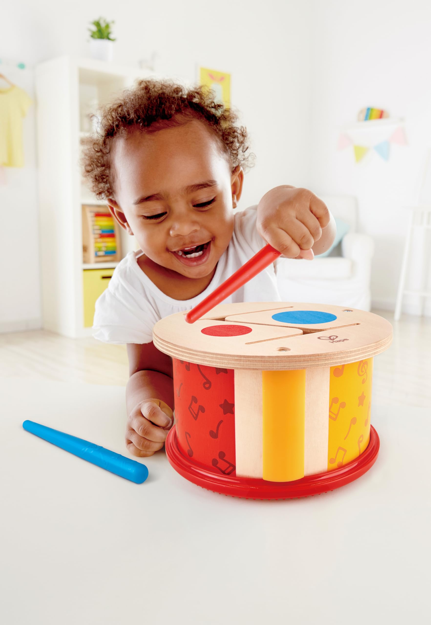 Hape Tamburo a due facce con bacchetta 12 mesi