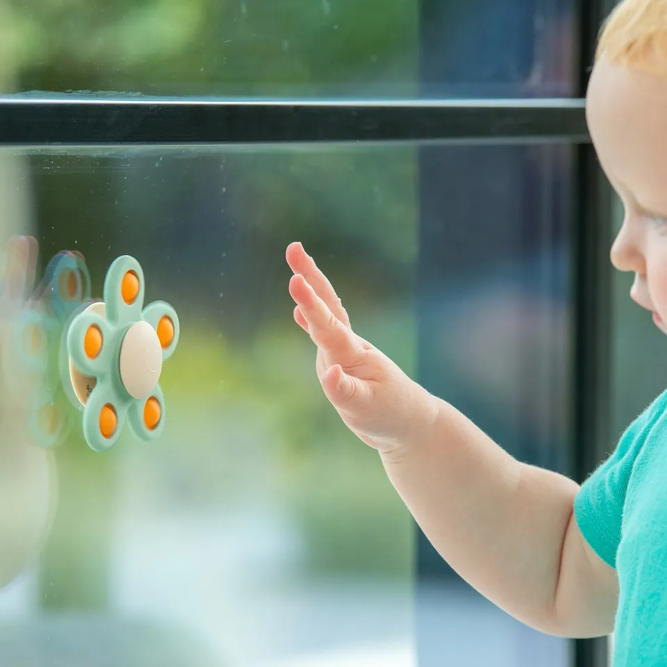 Tickit SiliSoft Flower Spinner sensoriale ventosa neutro