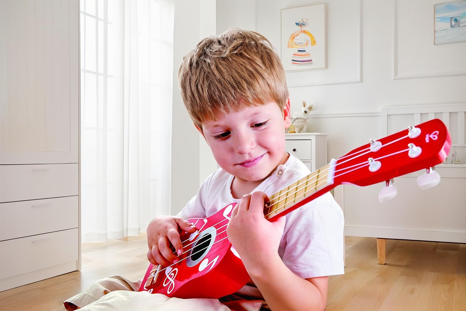 Hape E0603 ukulele in legno rosso accordabile dai 3 anni