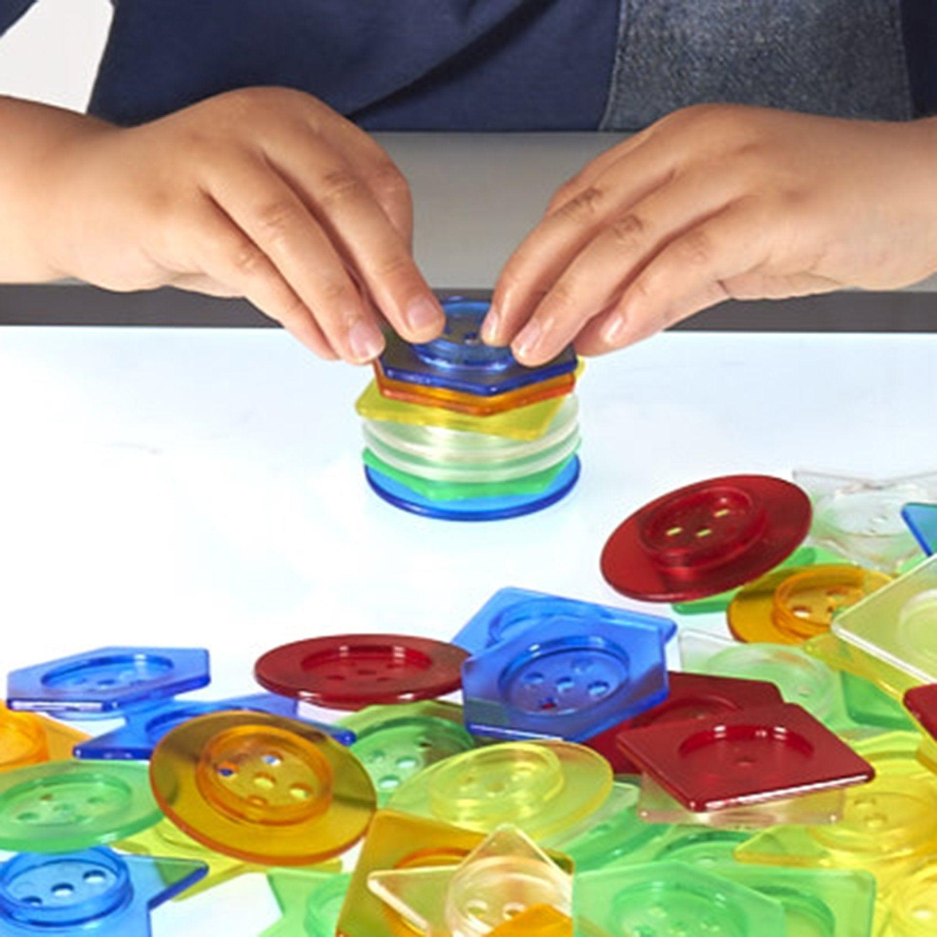 Tickit Stackable Translucent bottoni traslucidi 144 pezzi con lacci